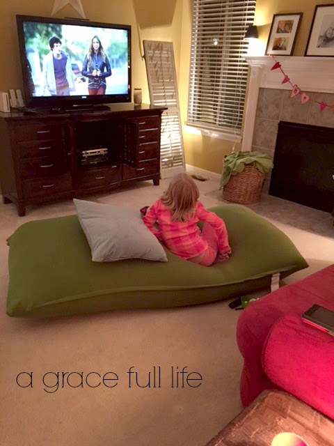 watching television on the yogibo chair