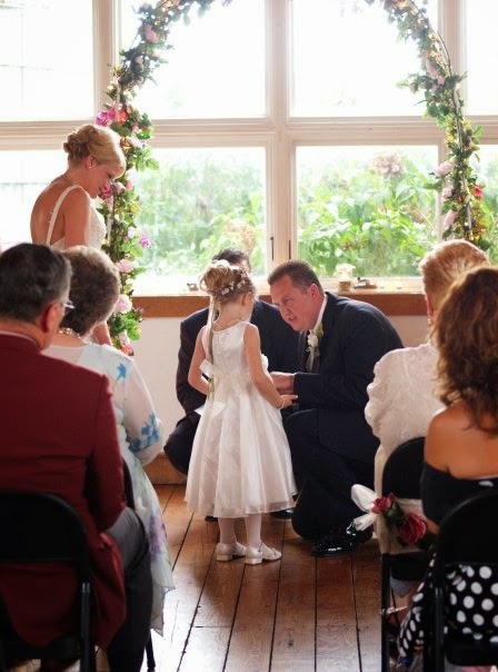 stepdad reciting vows to stepdaughter